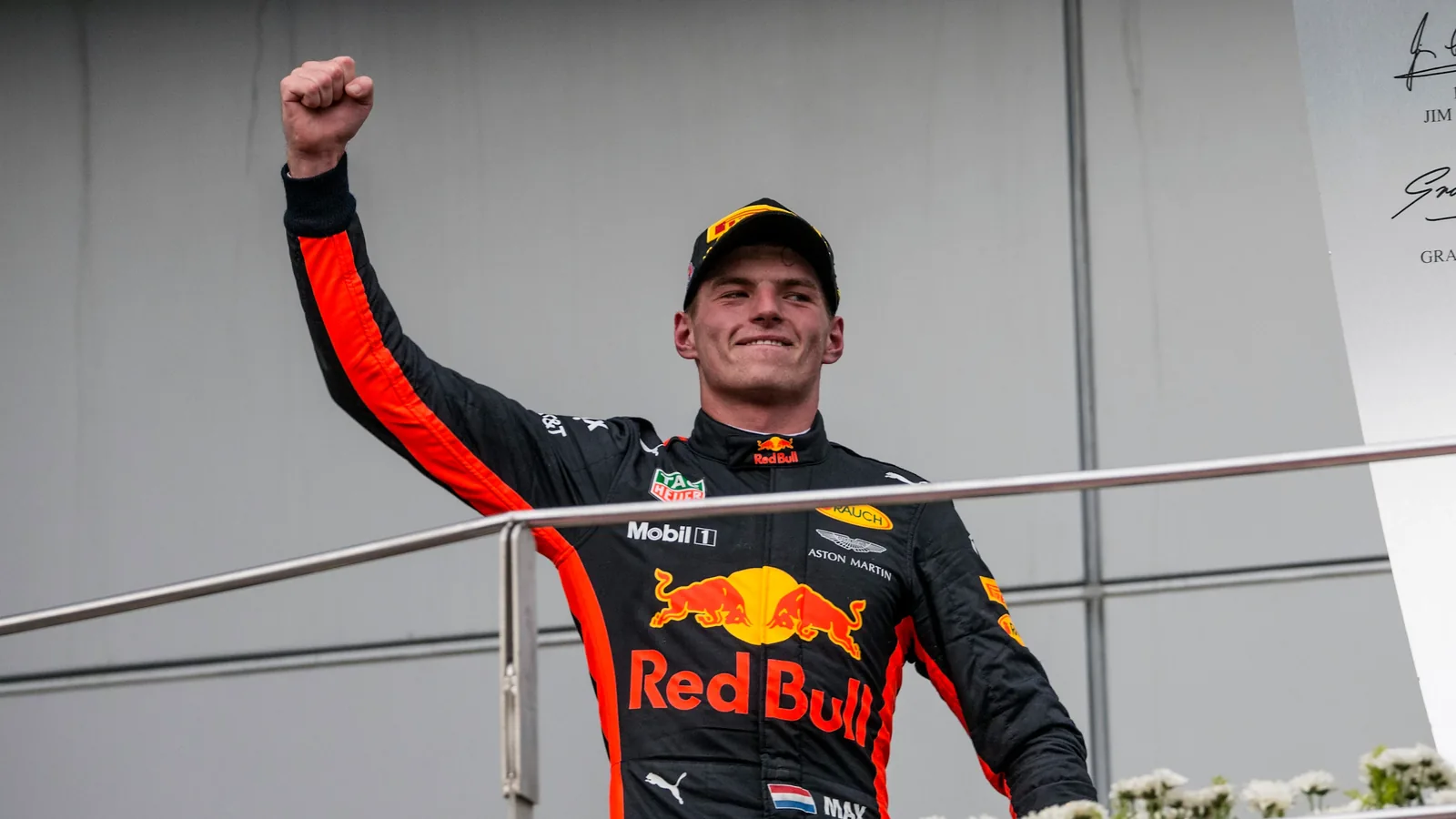 Max Verstappen celebrates on the podium after winning the 2017 Malaysian Grand Prix at Sepang