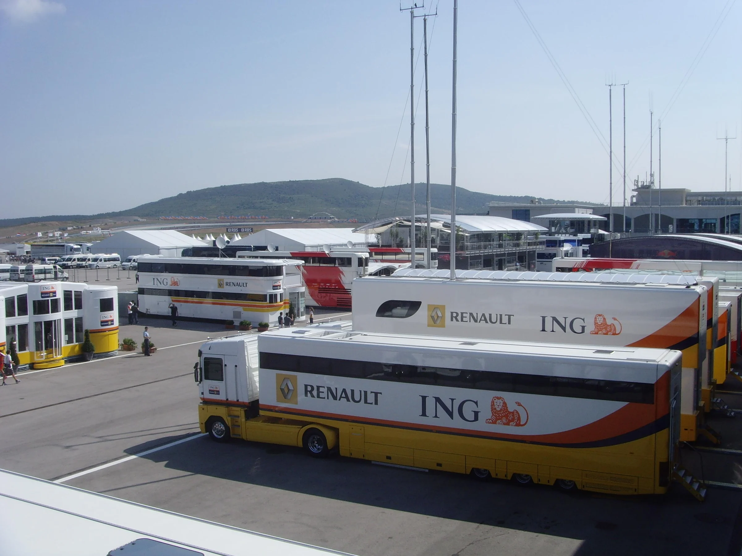Formula 1 freight truck parked in a Grand Prix paddock