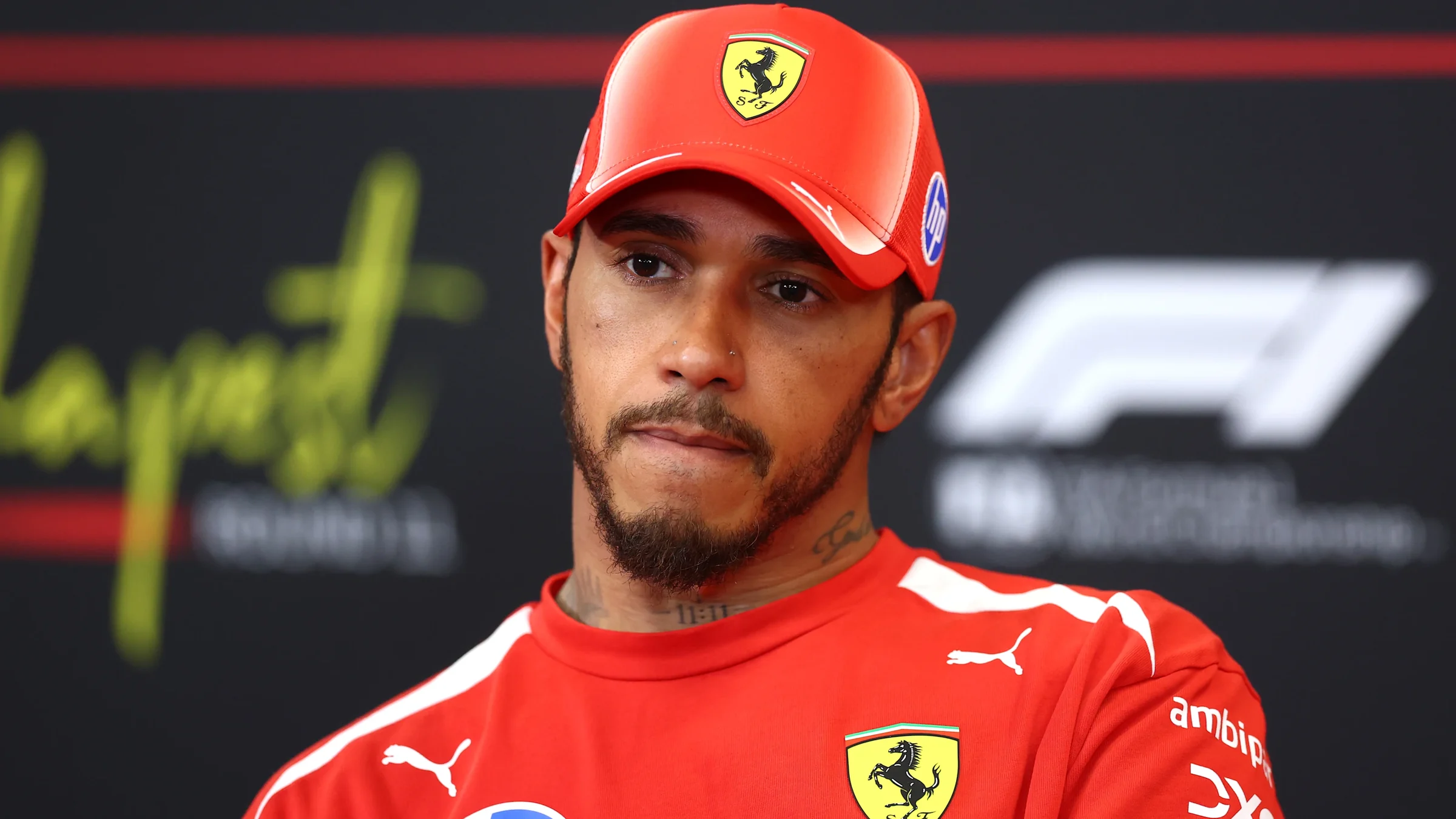 Lewis Hamilton in Ferrari team clothing during the 2026 Hungarian Grand Prix qualifying press conference