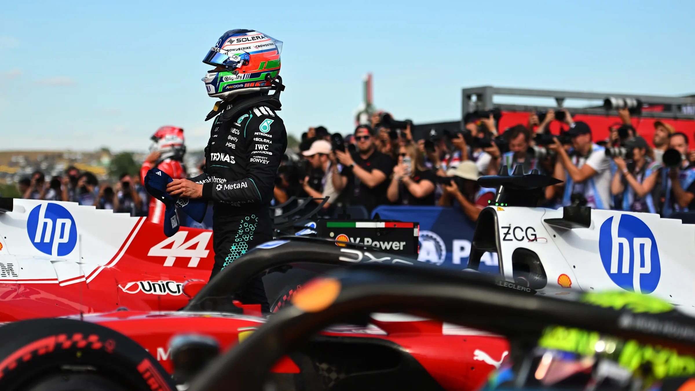 Kimi Antonelli in Mercedes racewear walking through parc ferme after 2026 Hungarian Grand Prix qualifying