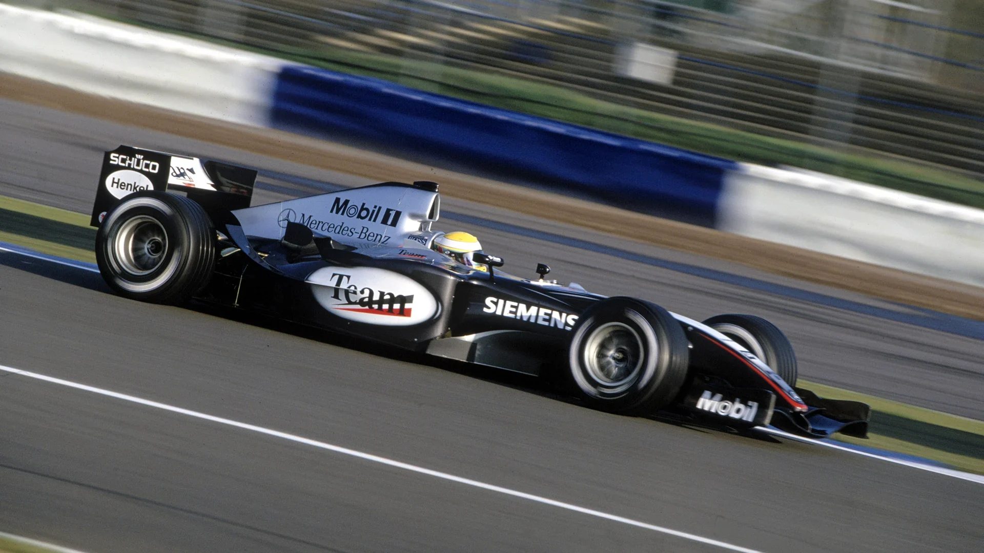 Teenage Lewis Hamilton driving the McLaren MP4-19 during his first Formula 1 test at Silverstone