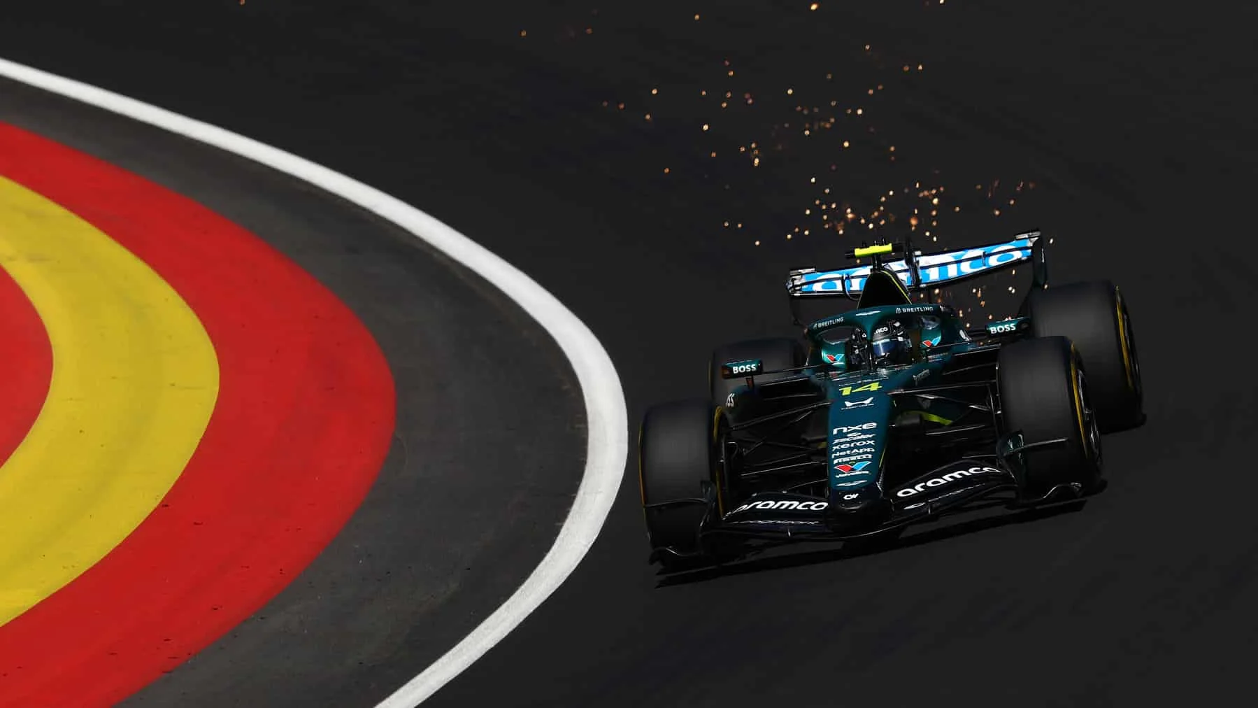 Fernando Alonso's Aston Martin loaded through La Monumental at Madring