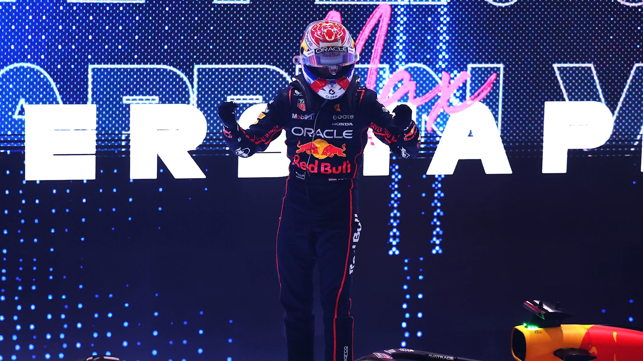 Max Verstappen celebrates on the podium at the 2025 Qatar Grand Prix in Lusail