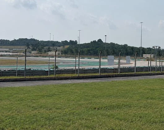 Grass viewing area and circuit sightline from B Hillstand at Sepang